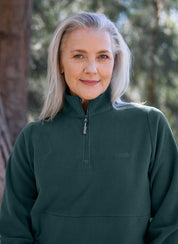 Older woman wearing the Sugarloaf Fleece in Pine Green