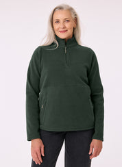 Older woman wearing the Sugarloaf Fleece in Pine Green